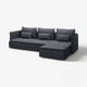 Dark grey sectional sofa with clean lines, loose cushions, right-facing chaise. Modern living.