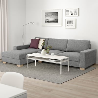 Modern living room with SÖRVALLEN sectional sofa, coffee table, and minimalist decor.