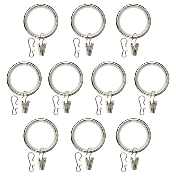 Twelve nickel-plated curtain rings, half with clips, half with hooks, arranged neatly.