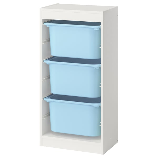 A TROFAST white storage unit with three blue plastic drawers. The drawers are stackable and removable.