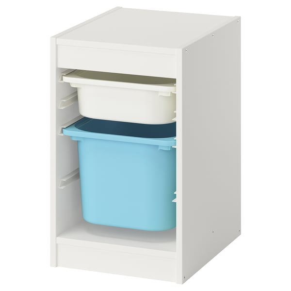 An IKEA TROFAST white storage unit with blue and white plastic boxes. Simple and square-shaped, its ideal for organising childrens items.