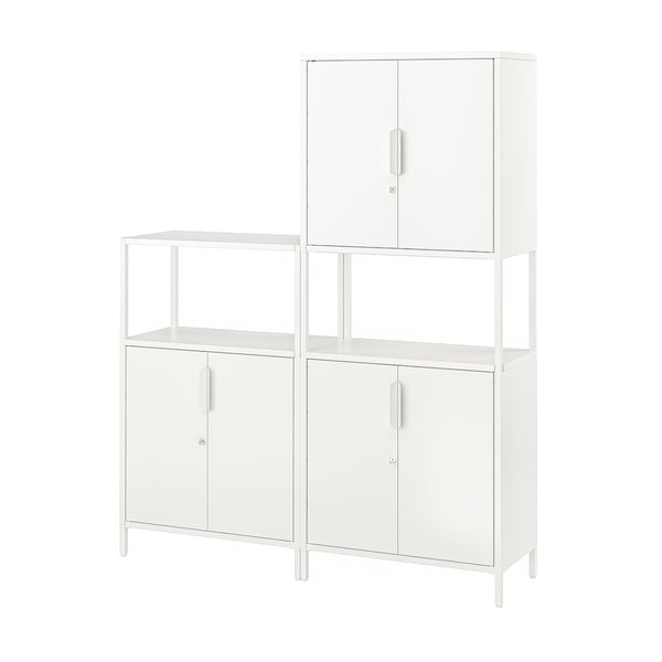 A white TROTTEN storage unit with metal frames and doors. It has a modern design with adjustable feet and lockable storage.