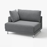 A grey UPPÅKRA sofa with sleek metal legs, featuring a plush, modern design.