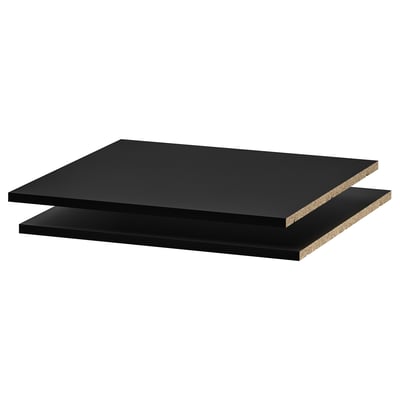 Two black rectangular UTRUSTA shelves stacked, smooth and sleek design, durable melamine surface.