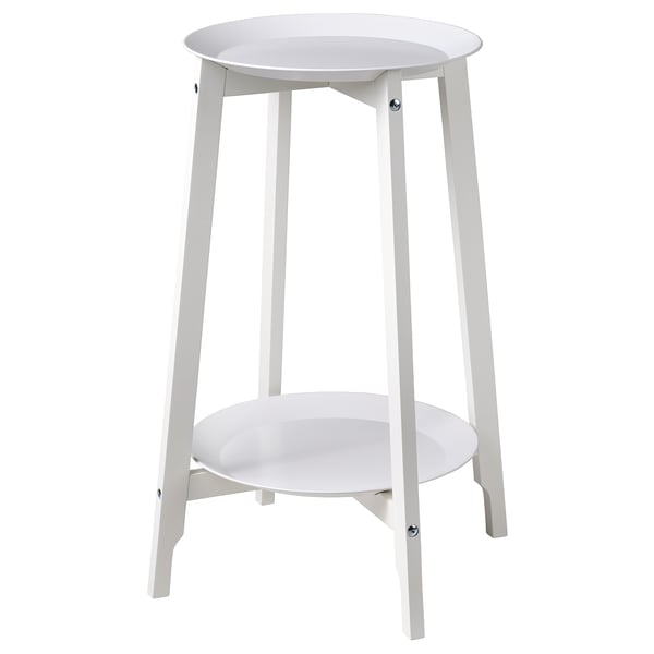 Un support de plantes ALPVIDE blanc avec un plateau rond en acier et des pieds en bois.