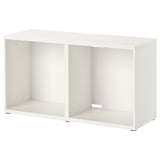 Unité de rangement BESTÅ blanche, design minimaliste moderne avec compartiments ouverts, pieds réglables.