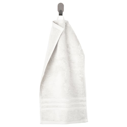 Serviette blanche BROKGLIM avec bordure tissée, suspendue. Coton biologique doux.