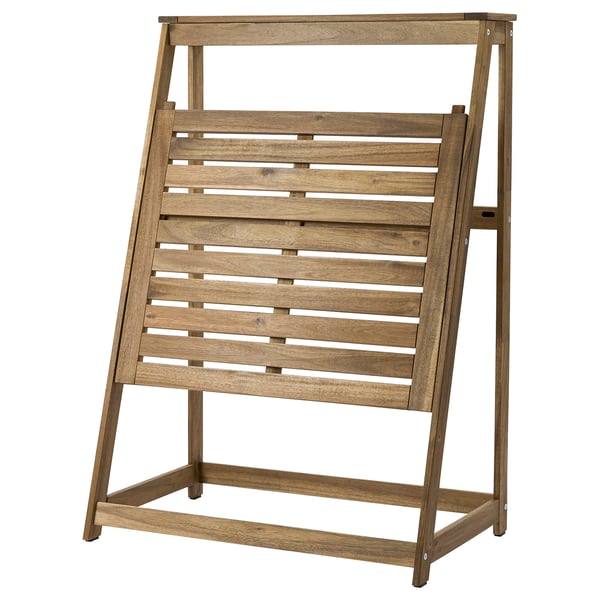 Table pliante en acacia DJUPÖN : design marron, rectangulaire, à lattes, parfaite pour les petits espaces.