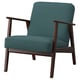 Fauteuil de style vintage en tissu sarcelle avec cadre en bois brun foncé, dossier incliné et accoudoirs en bois.