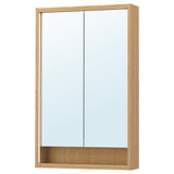 Armoire de toilette en bois FAXÄLVEN de couleur claire avec éclairage intégré ; Design rectangulaire et épuré.