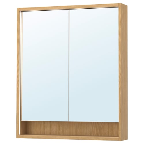 Une armoire de toilette en bois FAXÄLVEN avec éclairage intégré. Il est rectangulaire, brun clair, avec un design élégant et une étagère au fond.