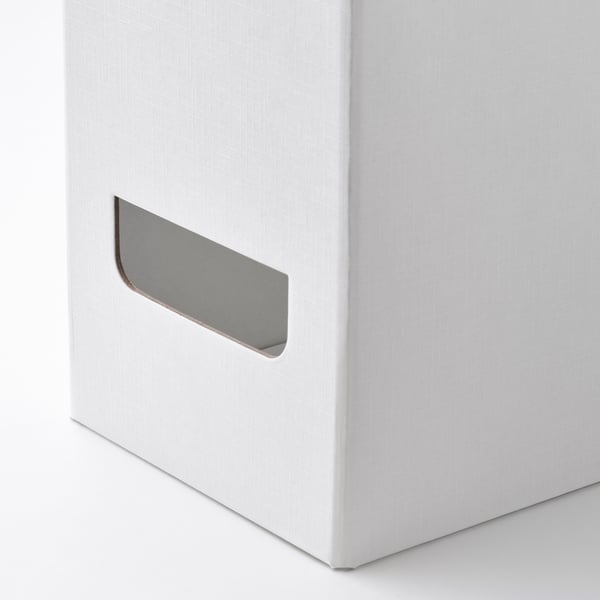 Une lime à magazines blanche élégante avec une poignée en métal robuste, parfaitement conçue pour organiser les journaux et les magazines.