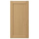 Une porte d’armoire FORSBACKA en placage de chêne chaud présentant un design classique encadré avec des bords biseautés.