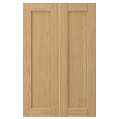 Portes d’armoires de cuisine Forsbaka, chêne clair, cadre en bois avec bords biseautés, design classique simple.