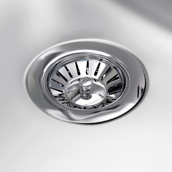 Crépine d’évier en métal poli, design élégant, surface en acier inoxydable de haute qualité, fentes de drainage efficaces.