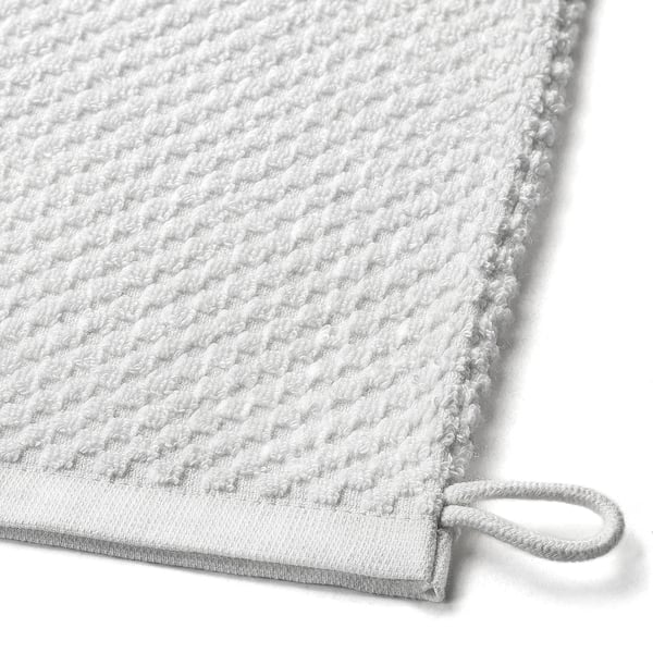 Gant de lavage en éponge avec boucle. Du coton doux et absorbant. Lavable en machine. Ajustement confortable.