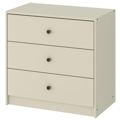 Une commode beige GURSKEN avec trois tiroirs, un design simple et des boutons circulaires.
