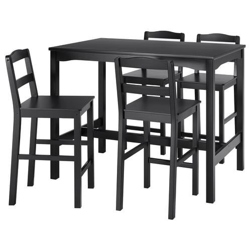 Ensemble de salle à manger en bois noir HÄGERNÄS avec table carrée et quatre chaises assorties pour les espaces compacts.