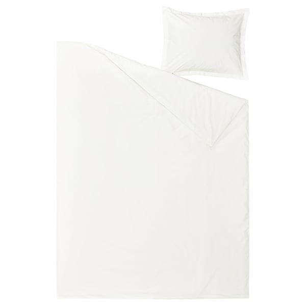 Une housse de couette en coton HAMPFLOCKEL d’un blanc éclatant avec une taie d’oreiller, dotée d’un design classique et d’un tissage en percale.