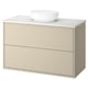 Lavabo beige HAVBÄCK avec plan de travail et bol blancs.
