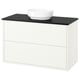 Armoire de salle de bain blanche avec plan de travail noir, lavabo blanc rond, design minimaliste moderne.