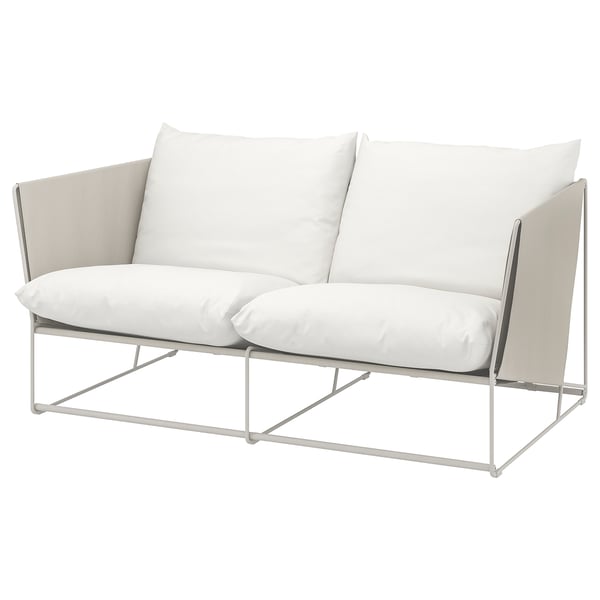 HAVSTEN, canapé d’extérieur blanc avec coussins sur structure métallique.
