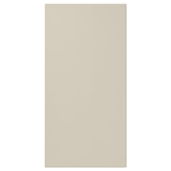 Porte HAVSTORP beige, lisse et rectangulaire, matériau en panneaux de fibres, lignes épurées, design moderne.