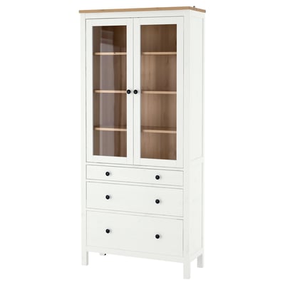 Armoire en bois HEMNES blanc avec portes et tiroirs en verre. Pin massif, forme rectangulaire.