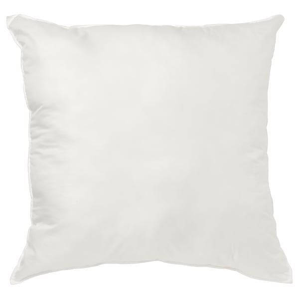 INTÉRIEUR - coussin blanc. Design dodu et carré. Fabriqué en polyester recyclé.