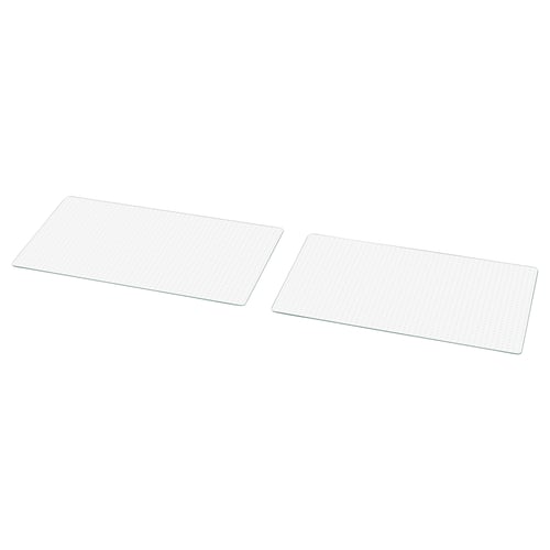Deux plaques de verre transparentes, rectangulaires, avec un motif de grille, sont posées à plat côte à côte.