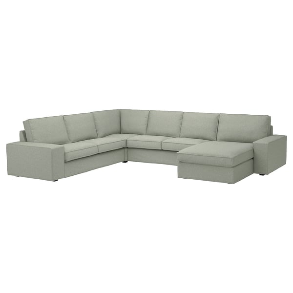 Canapé sectionnel KIVIK gris clair avec accoudoirs amovibles, coussins profonds et un design moderne.