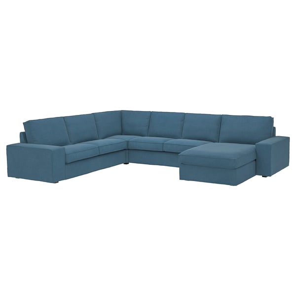 Canapé KIVIK bleu avec accoudoirs amovibles et chaise.