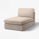 Une chaise longue beige KIVIK au design élégant, des coussins confortables et un tissu chenille légèrement réfléchissant.