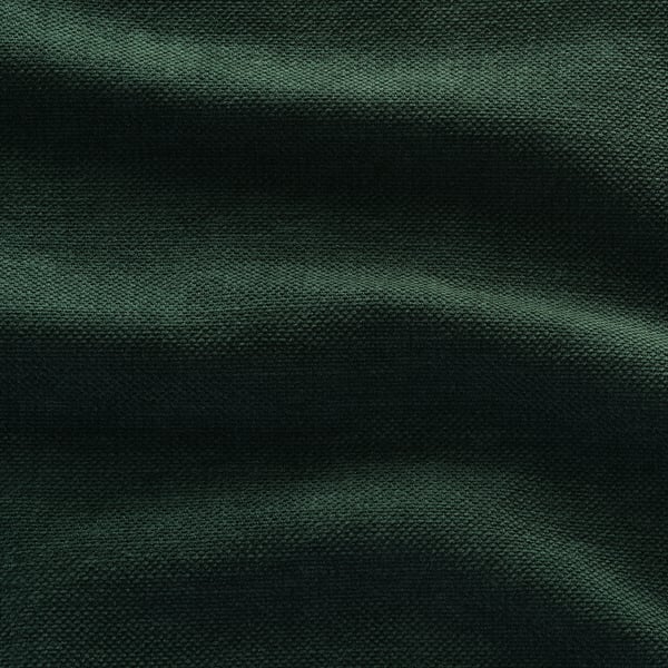 Gros plan sur le tissu texturé vert foncé des canapés KIVIK mettant en valeur son tissage chenille doux et durable.