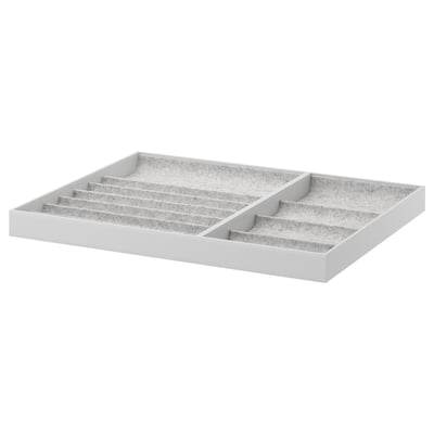 Plateau de rangement gris KOMPLEMENT, compartiments doublés de feutre pour les accessoires.