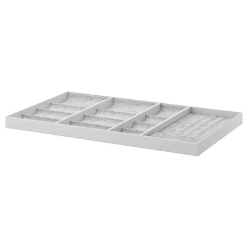 Plateau de rangement blanc KOMPLEMENT, rectangulaire avec 9 compartiments pour les accessoires.