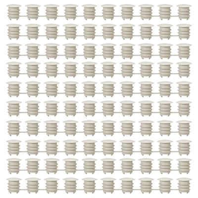 Grille de capuchons de meubles en plastique KOMPLEMENT blanc, de forme et d’alignement uniformes.