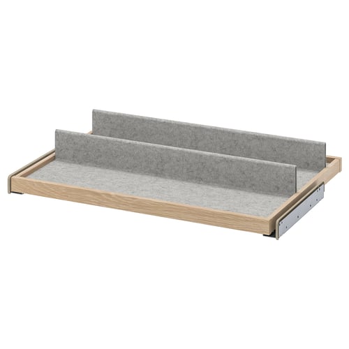 Un plateau à chaussures KOMPLEMENT, de couleur gris clair, en panneaux de fibres et en plastique, avec un design coulissant pour un accès facile.