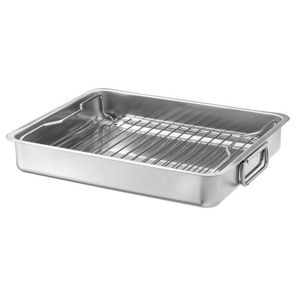 Un plat à rôtir en acier inoxydable KONCIS avec une grille de gril, parfait pour une utilisation au four ou au barbecue.