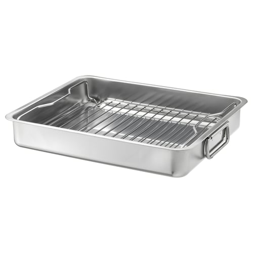 Un plat à rôtir en acier inoxydable KONCIS avec une grille de gril, parfait pour une utilisation au four ou au barbecue.