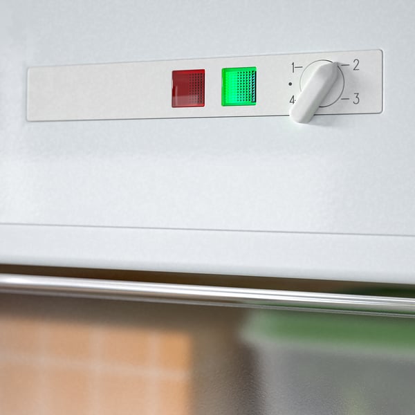 Panneau de commande du congélateur intégré avec cadran de température et indicateurs LED.
