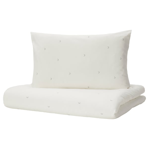 Parure de lit pour bébé blanche avec motif croissant de lune, en coton doux, de forme rectangulaire.