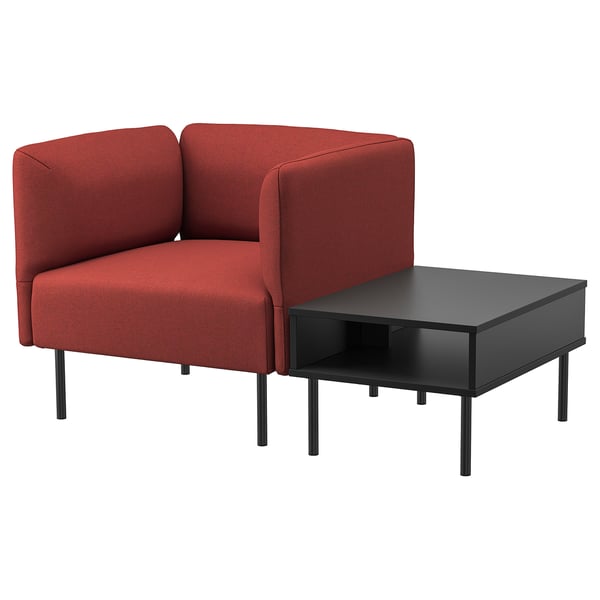 Canapé modulaire rouge avec table basse noire.