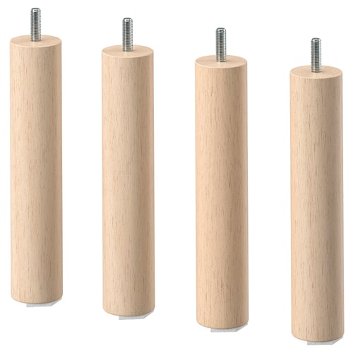 Quatre pieds en bois de couleur claire avec des extrémités filetées disposées côte à côte.