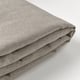 Tissu gris plié, texture lisse, léger motif à chevrons.