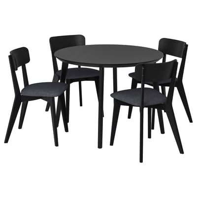 Table à manger ronde noire avec quatre chaises assorties, design élégant, matériaux en bois dur.