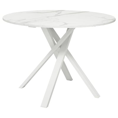 Table à manger ronde moderne avec plateau en marbre blanc et pieds en métal robustes.