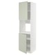 Armoire de cuisine Ikea METOD en vert avec deux portes ouvertes et des étagères.