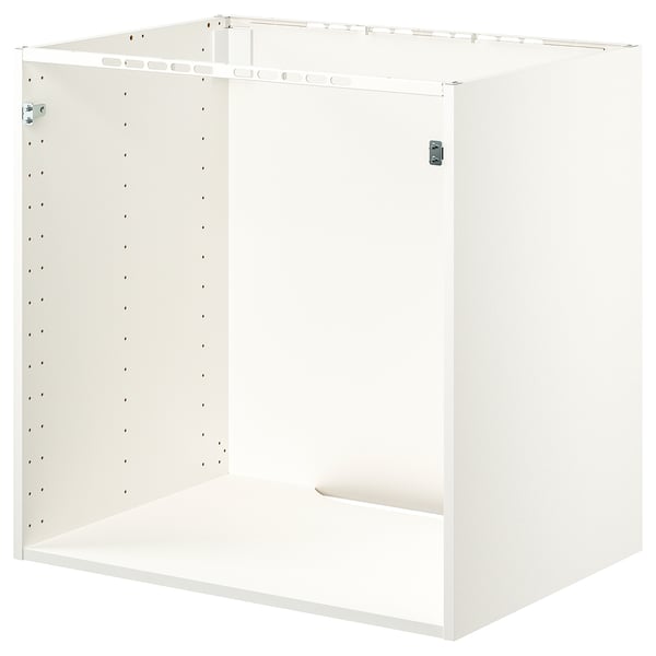 Cadre blanc d’armoire METOD avec dos perforé, structure en particules.