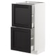 Une armoire de cuisine ikea METOD avec des portes en bois teinté foncé et un cadre blanc, mettant en valeur deux tiroirs.